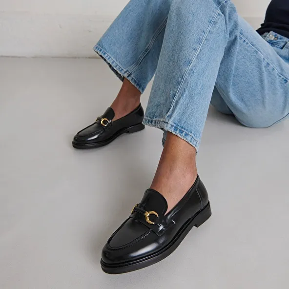 Loafers with gold bits in black glazed leather