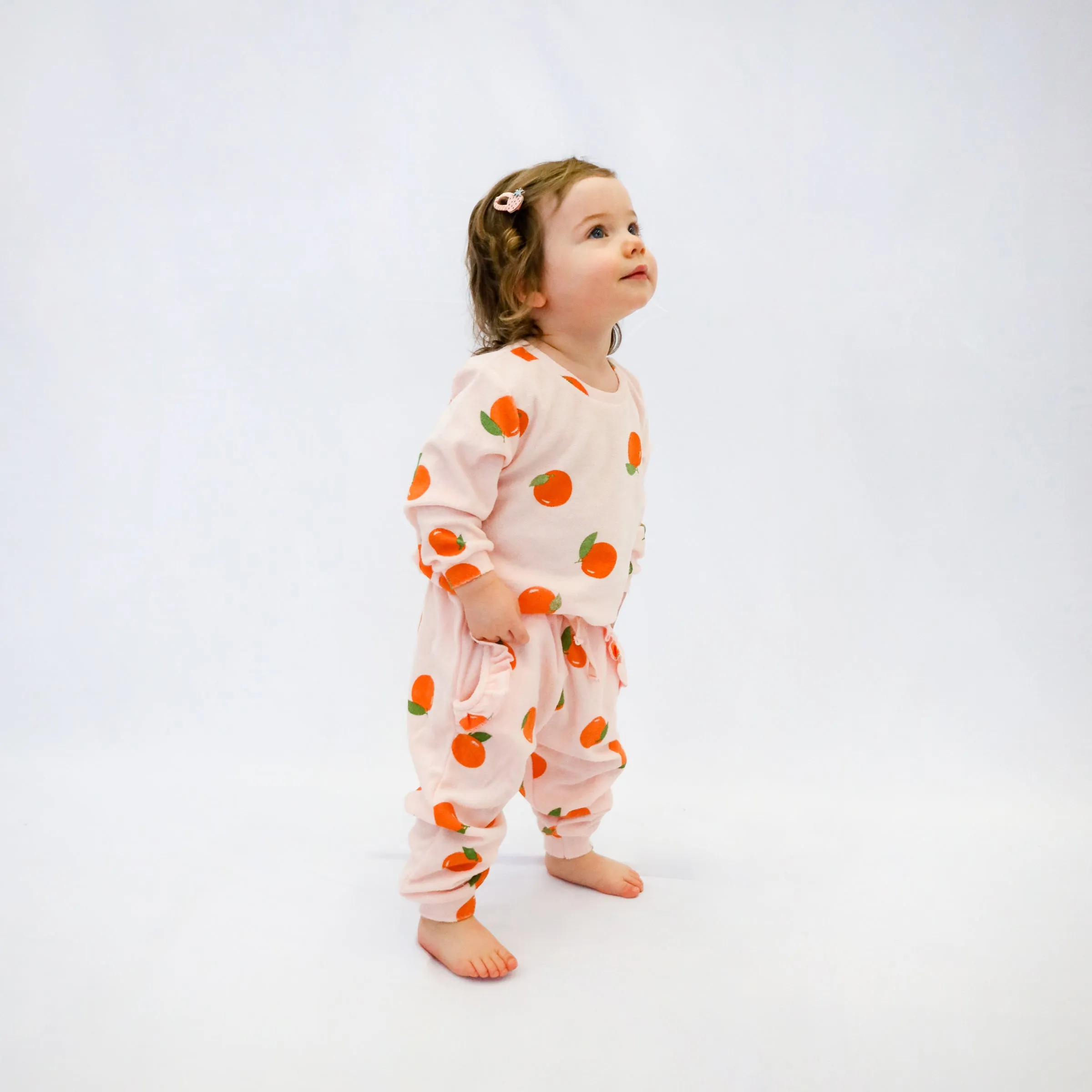 oh baby! Cotton Terry Ruffle Pocket Jogger - Oranges Print - Pale Pink