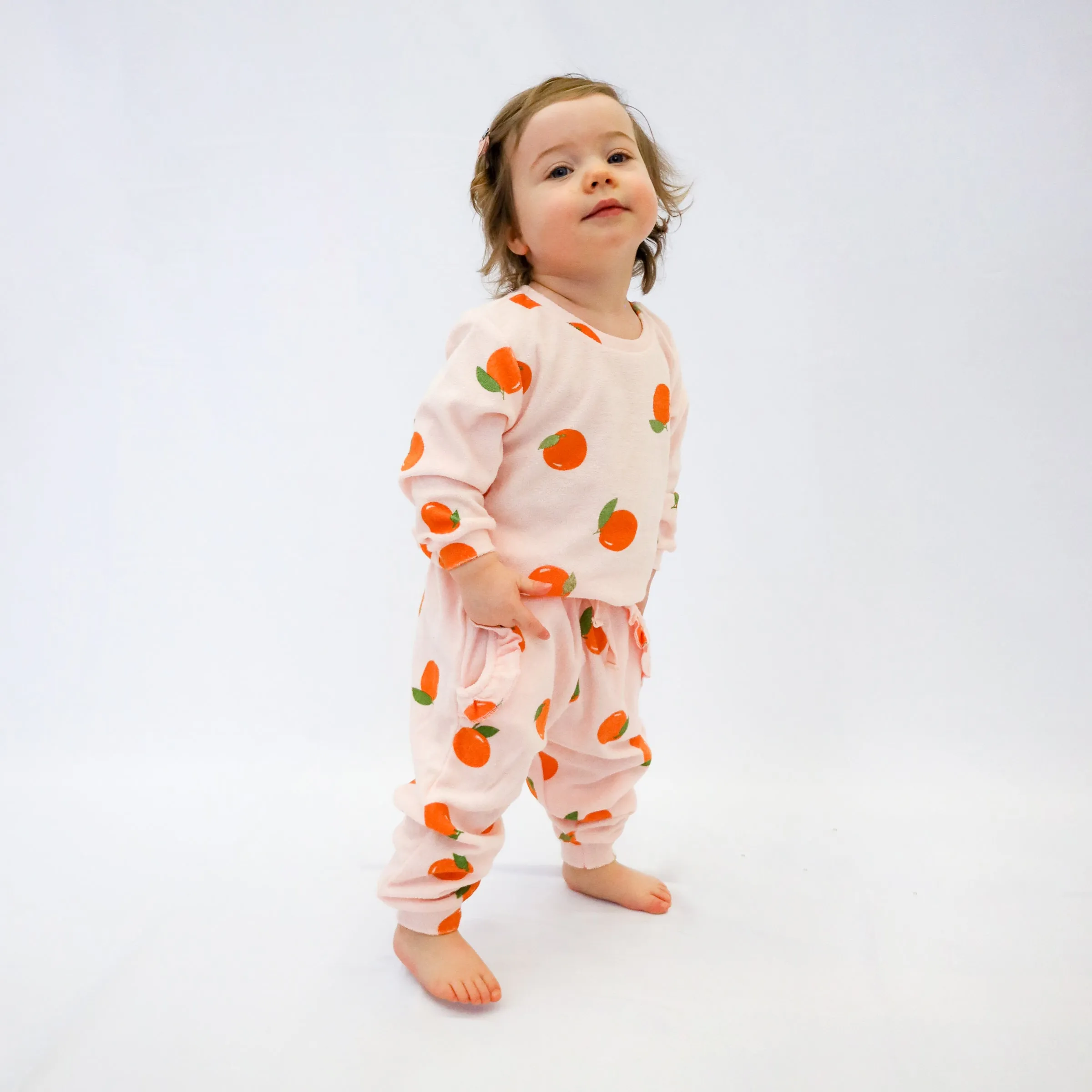 oh baby! Cotton Terry Ruffle Pocket Jogger - Oranges Print - Pale Pink