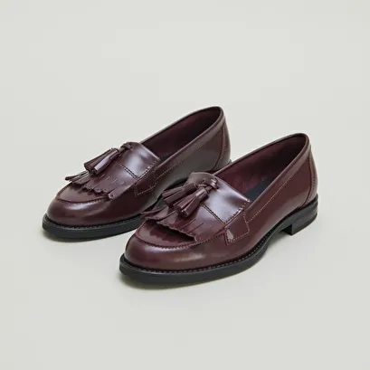 Tassel loafers in burgundy glazed leather