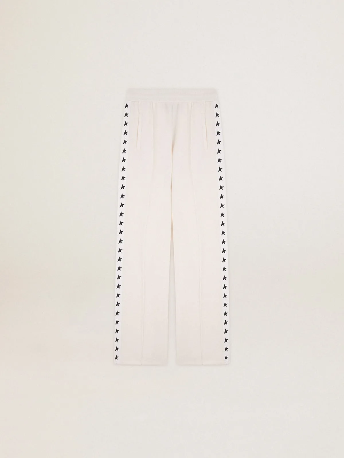 Women’s white joggers with stars on the sides